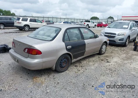 1999 Toyota Corolla Le z USA, uszkodzony, nr VIN 1NXBR12E3XZ238937
